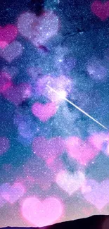 Galaxy wallpaper with pink hearts and shooting star on a dark blue sky.