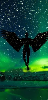 Silhouette with wings amidst green aurora and starry sky.