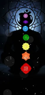 Silhouette meditating with chakra symbols on cosmic background.