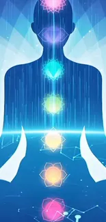 Silhouette with colorful chakras on radiant blue background.