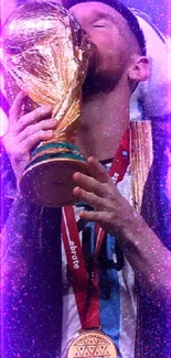 A soccer champion kissing the gold trophy in celebration.