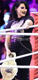 Wrestling champion holding a decorated title belt in the ring.