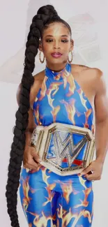 Champion with flame outfit and title belt.