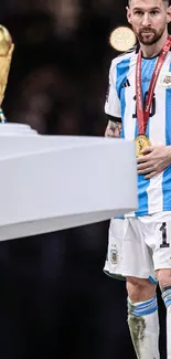 Argentine soccer player with World Cup trophy.