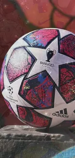 Colorful Champions League soccer ball design.