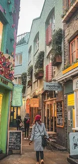 Vibrant alleyway with colorful shopfronts and street view.