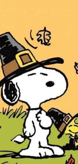 Snoopy and friend in pilgrim hats with autumn leaves.