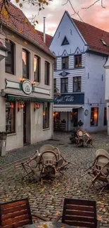 Charming evening street scene with cozy cafés and warm lighting.