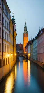 Charming cityscape with canal at dusk and colorful buildings reflecting in water.