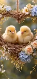 Two yellow chicks nestled in a heart-shaped floral wreath.