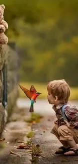 Cute child interacts with a teddy bear by a wall.