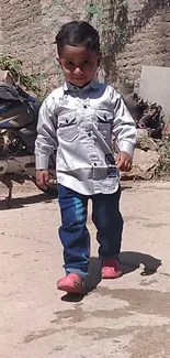 Child walking confidently in an urban alleyway.