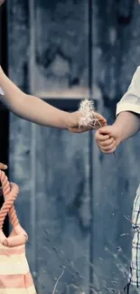 Children sharing dandelions against a vintage blue backdrop.