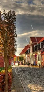 Charming cobblestone street with autumn hues and rustic buildings.