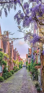 Cobblestone street with purple wisteria and brick houses.