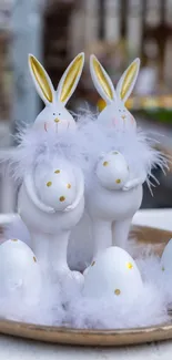 Adorable Easter bunnies with eggs on a tray.