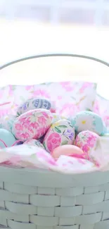 Pastel Easter basket with decorated eggs.