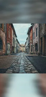 Charming European street with cobblestones and historic buildings.