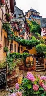 Charming European village with flowers and cobblestone street.