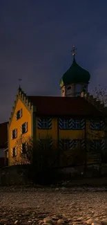 Village house at twilight with evening sky.