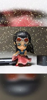 Chic figurine with glitter backdrop.