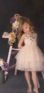 Young girl in floral dress amid pastel flowers on dark backdrop.