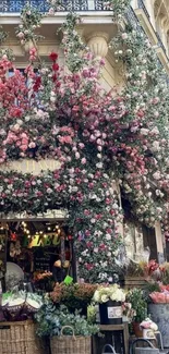 Charming flower shop with a lush floral facade and baskets of blooms.