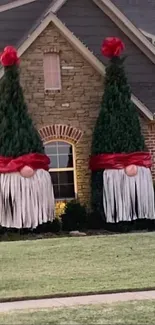 Festive Christmas tree decor in front of suburban house.