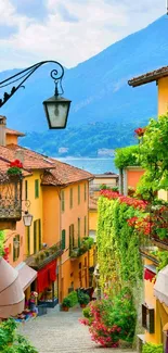 Colorful Italian street with mountain view.