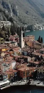 Aerial view of an Italian village by a lake with vibrant rooftops and greenery.