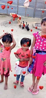 Three children in a rural outdoor scene playing.