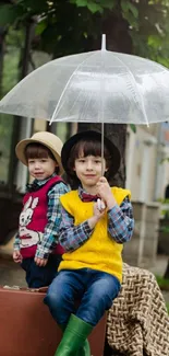 Two children with umbrella, vintage look in a charming outdoor scene.