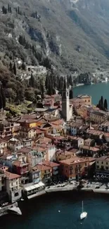 Aerial view of a charming lakeside village surrounded by mountains.