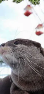 Adorable otter with green foliage in a natural setting.