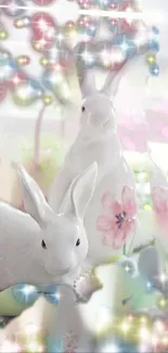 Pastel-colored rabbits with floral and bokeh accents wallpaper.