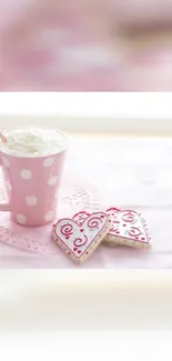 Pink polka-dotted mug with heart cookies wallpaper.