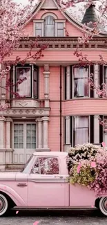 Pink house with vintage truck and blossoms mobile wallpaper.