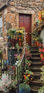 Rustic cottage entrance with vibrant flowers and stone steps.