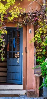 Rustic blue door surrounded by vibrant autumn vines.