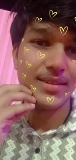 Smiling person with yellow heart filter on face.