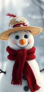 Charming snowman in red scarf with straw hat in snowy setting.