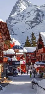 A charming snowy village with mountain backdrop.