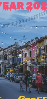 A vibrant city street at dusk with festive lights and colorful building facades.