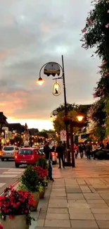 Charming street at sunset with flowers and vintage lamps, perfect for mobile wallpaper.