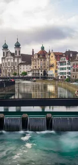 Charming Swiss town with historic architecture by a river, perfect wallpaper.