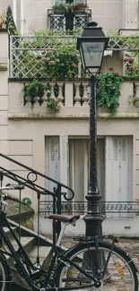 Vintage bicycle by a charming balcony in the city.