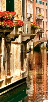 Venice canal scene with flowers and reflections.