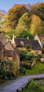 Serene autumn village with rustic cottages and vibrant trees.