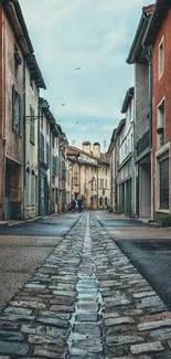 Vintage street view with charming architecture and cobblestones.