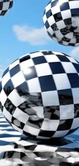 Checkered spheres floating under a blue sky.